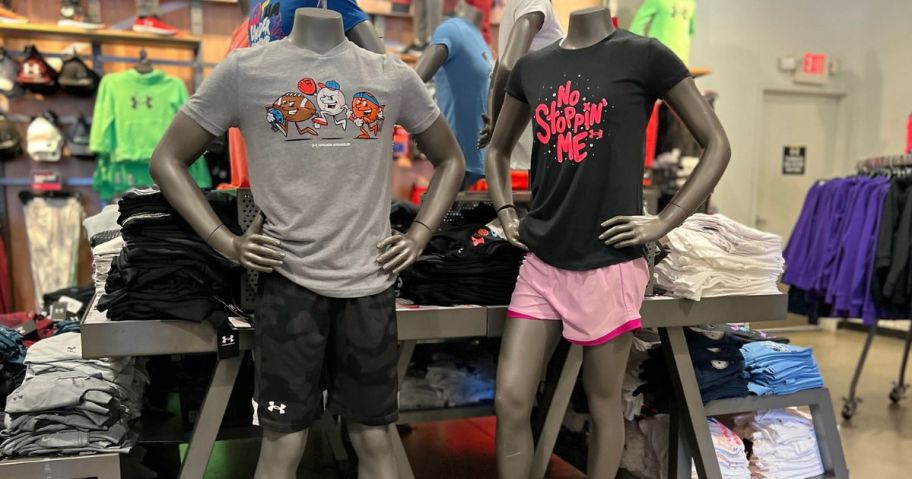 two mannequins with under armour kids clothing