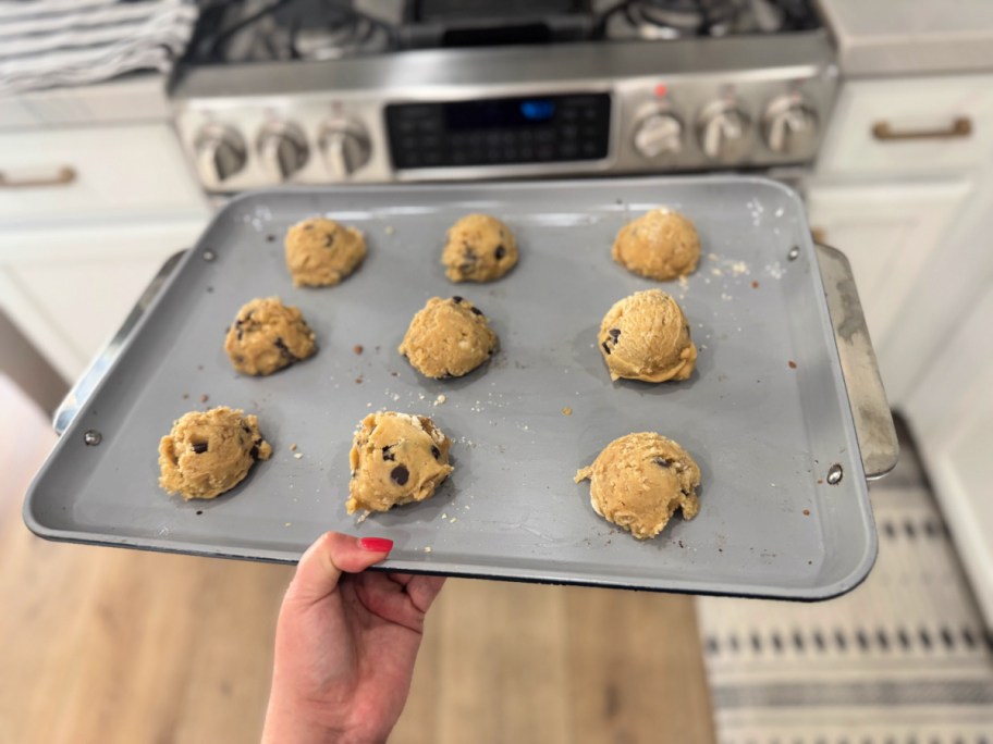 cookie dough balls on a sheet pan