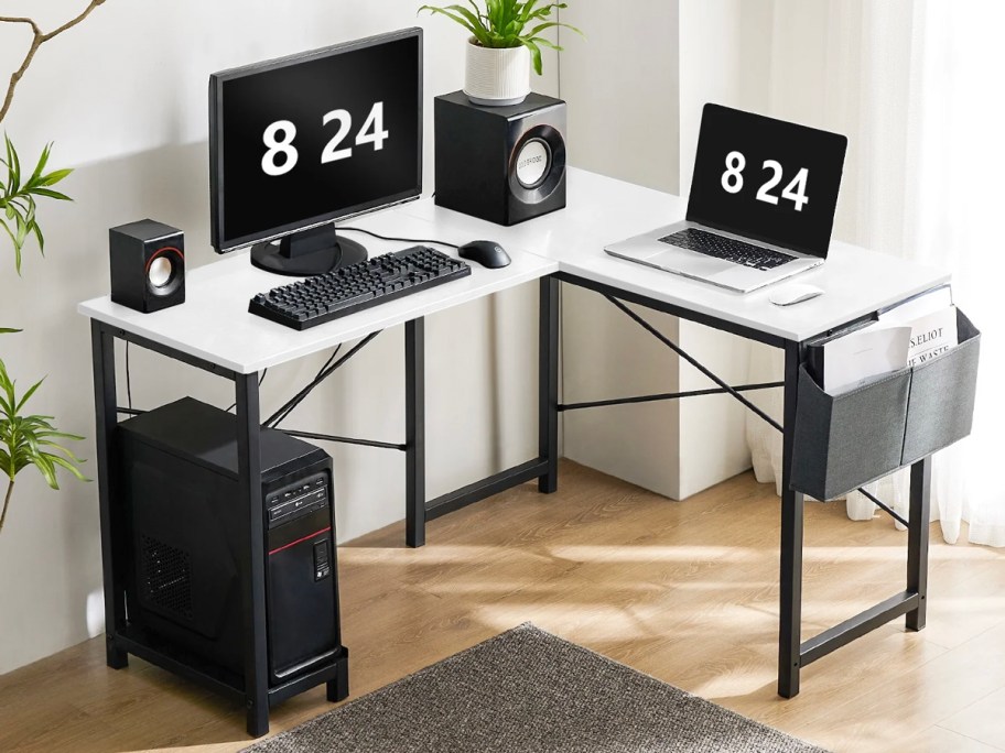 white and black l desk with onlineputers on top