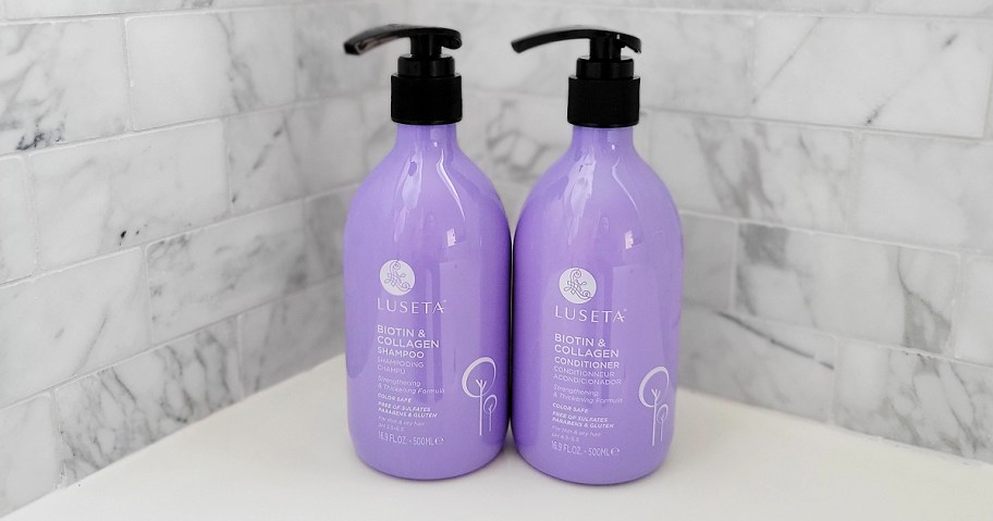 biotin and collagen shampoo & conditioner in purple bottles placed on the side of a bathtub