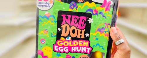 hand holding nee doh golden egg hunt box