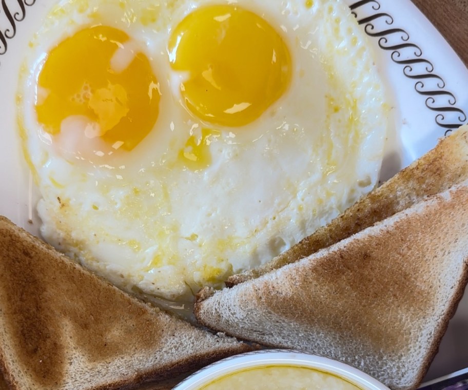 two eggs and toast breakfast 