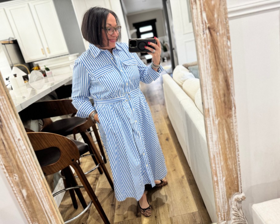 woman taking selfie in shirtdress