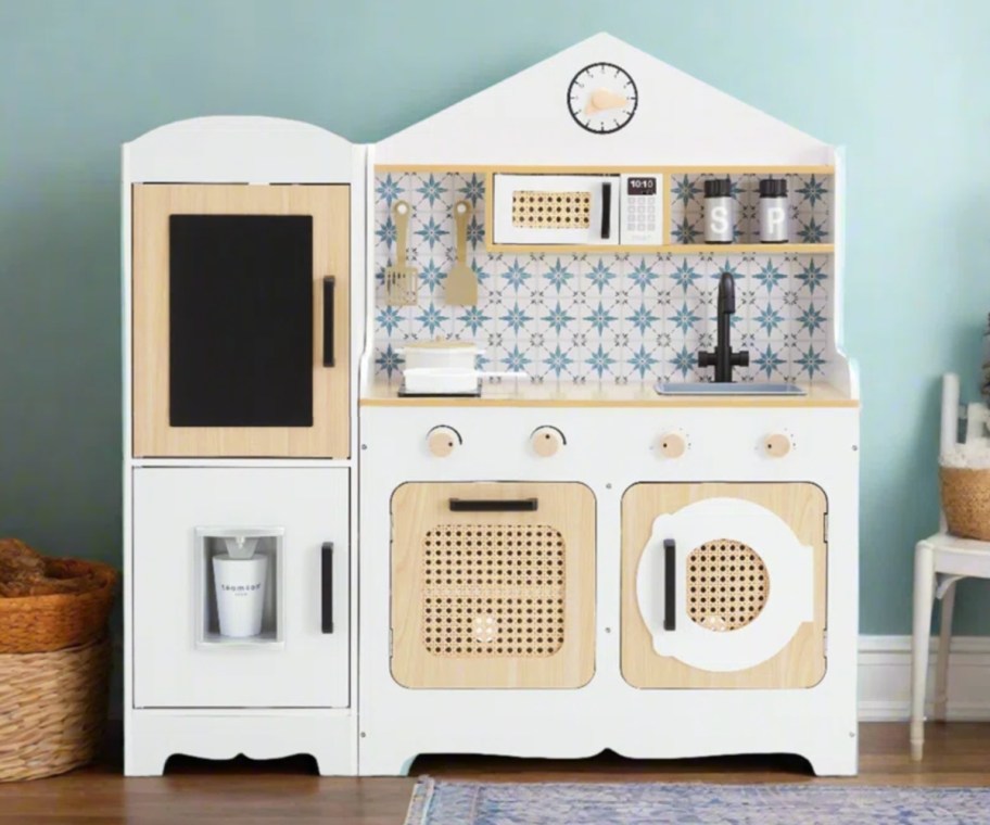 white wooden kids play kitchen