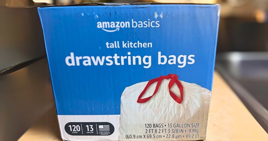 a large box of Amazon  Basics kitchen trash bags