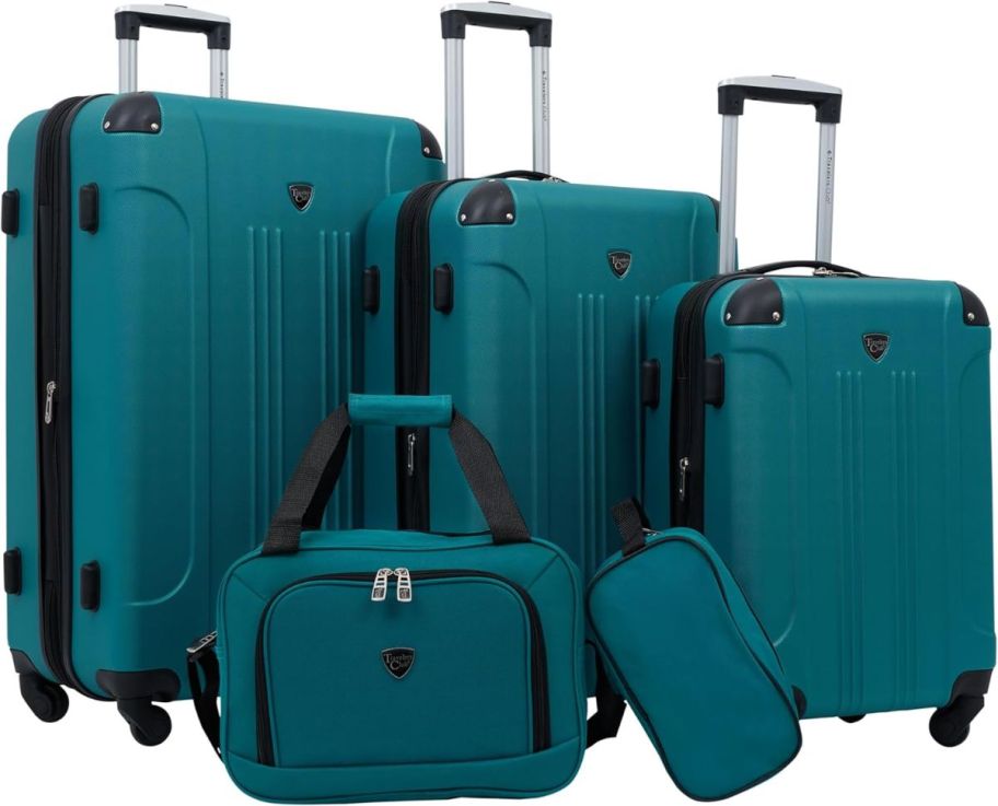 five piece spinner luggage set in teal stock image