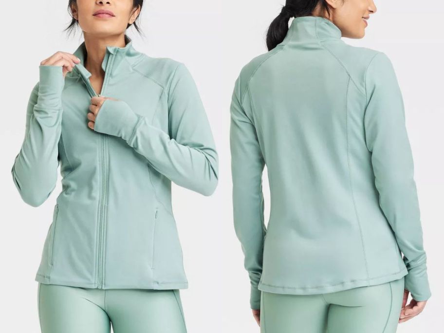 A woman wearing a green All in Motion Women's Full Zip Jacket