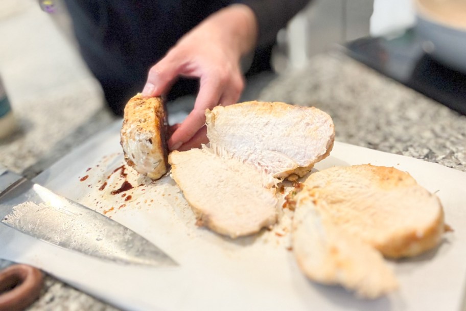 cutting chicken in half lengthwise like a bun