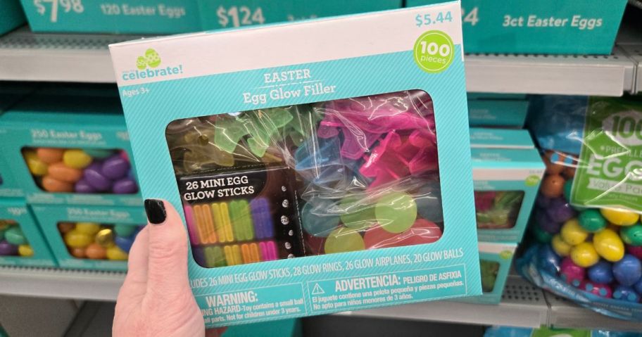 a box of Easter Egg Glow Fillers box in a person's hand in store