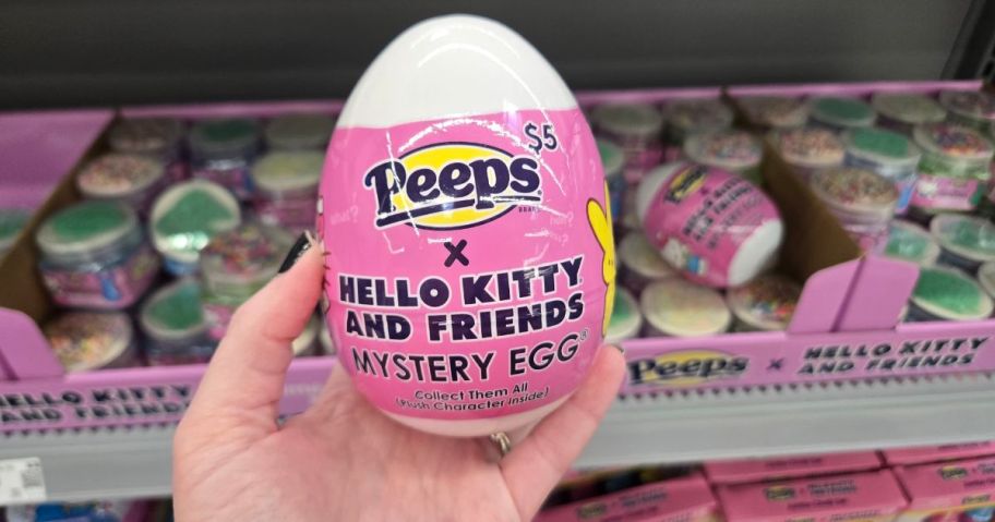 A person holding a Hello Kitty x Peeps Easter Mystery Egg at Walmart