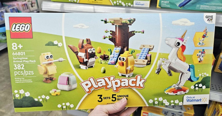 hand holding up LEGO Creator Spring Animal Play Pack box in store