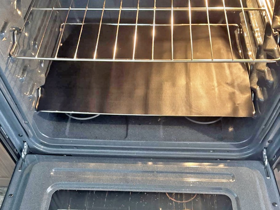 oven liner on rack inside of oven