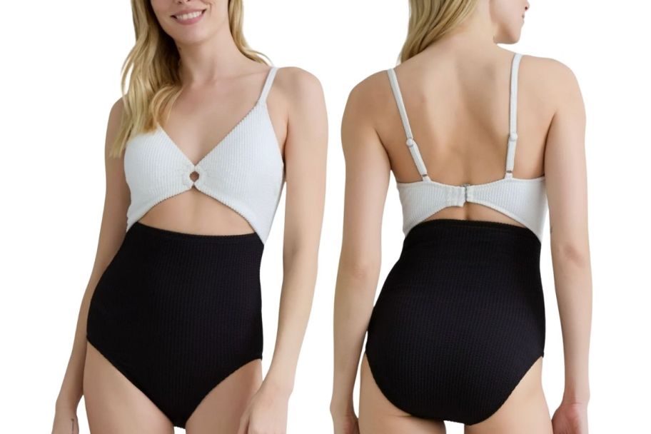 a model in black and white color block 1 piece swimsuit