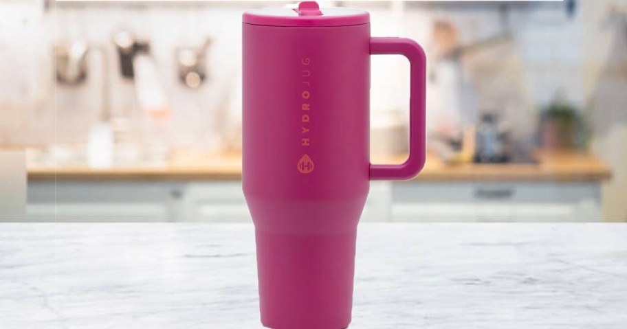 dark pink hydrojug tumbler on counter