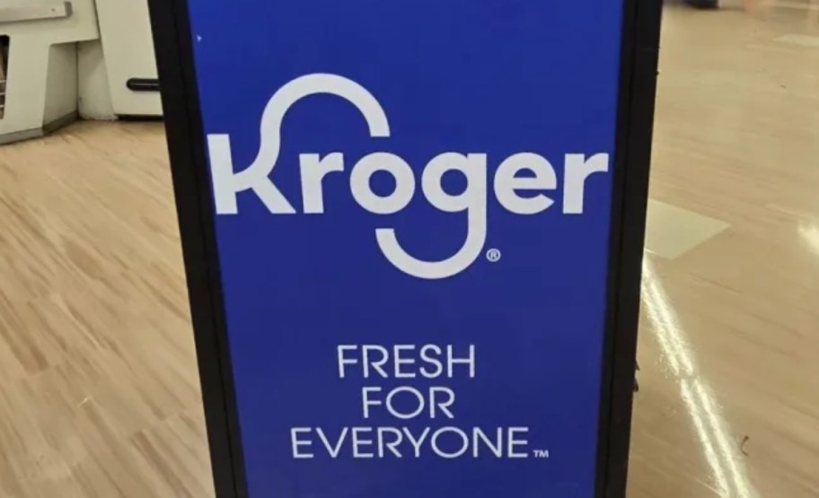 a blue and white kroger store sign