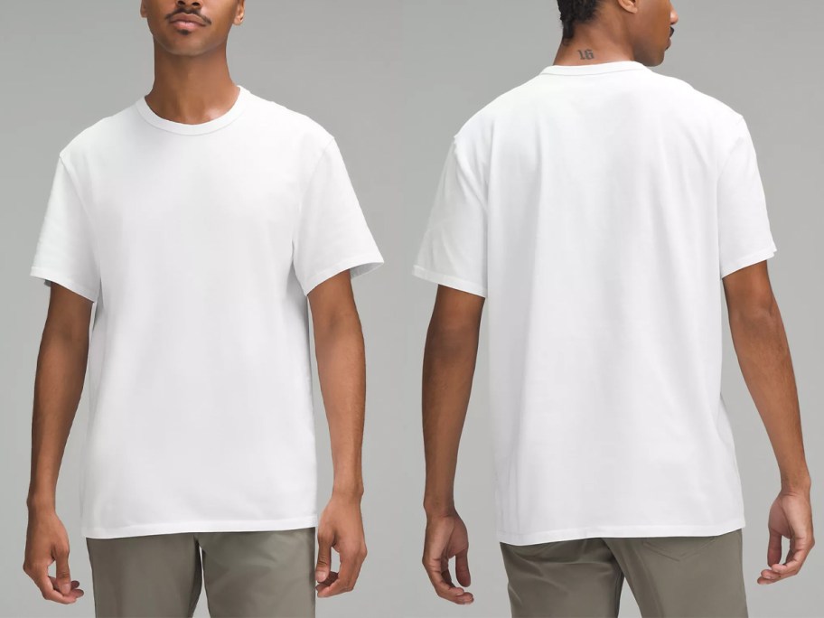 man wearing white tee 