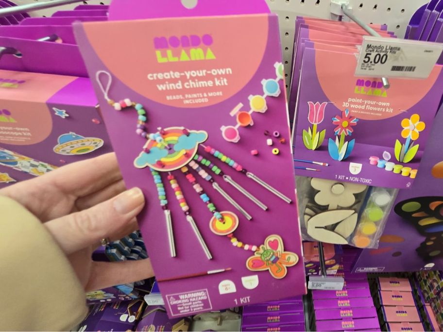 Mondo Llama Paint and Bead Wind Chime Craft Kit in hand in store