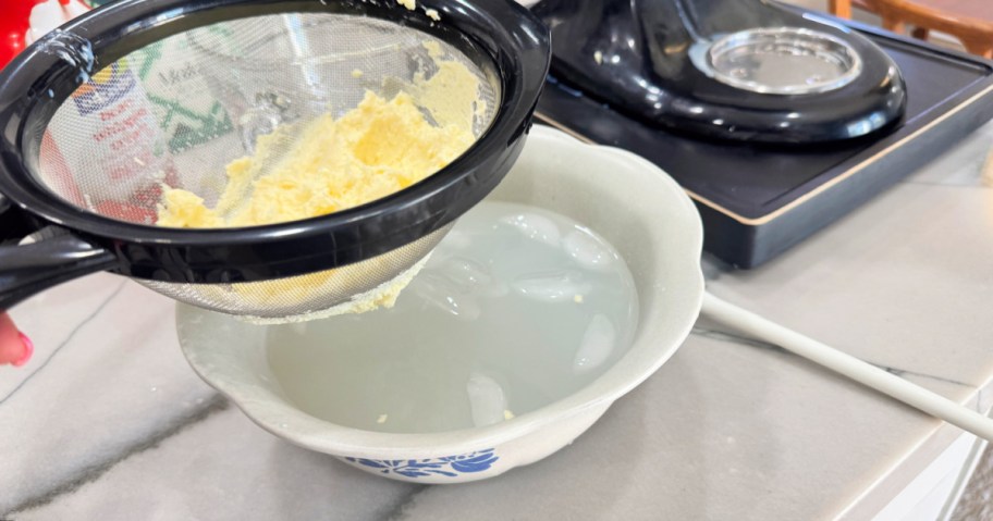 rinsing butter in cold ice water