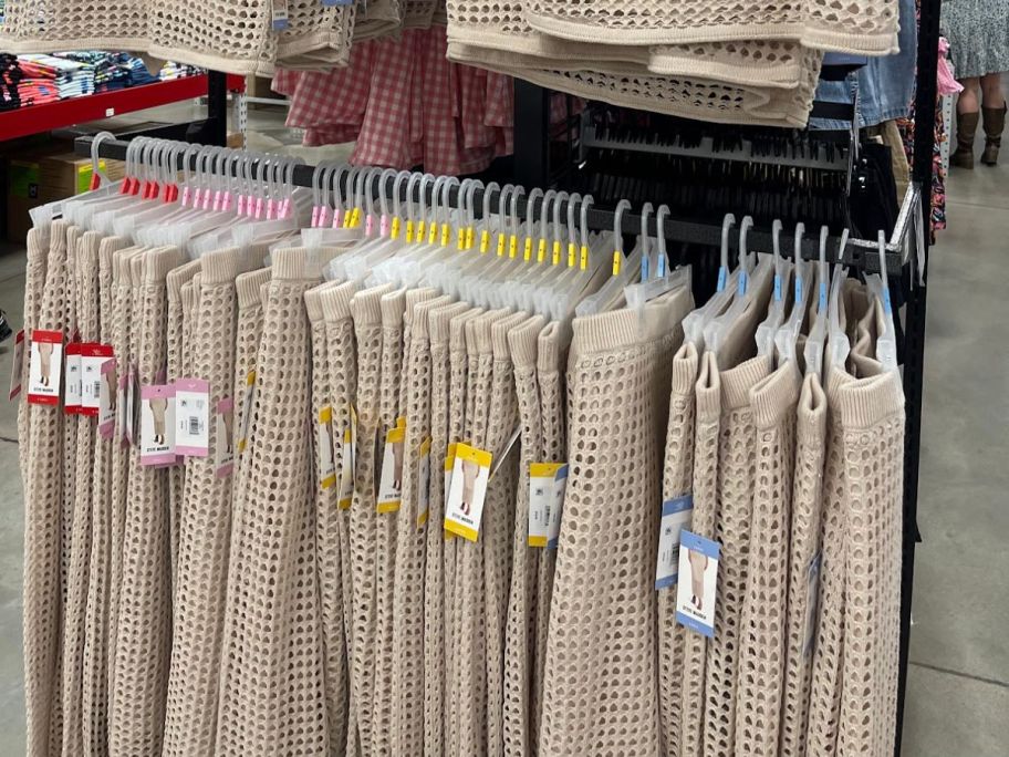 rack of tan crochet skirts