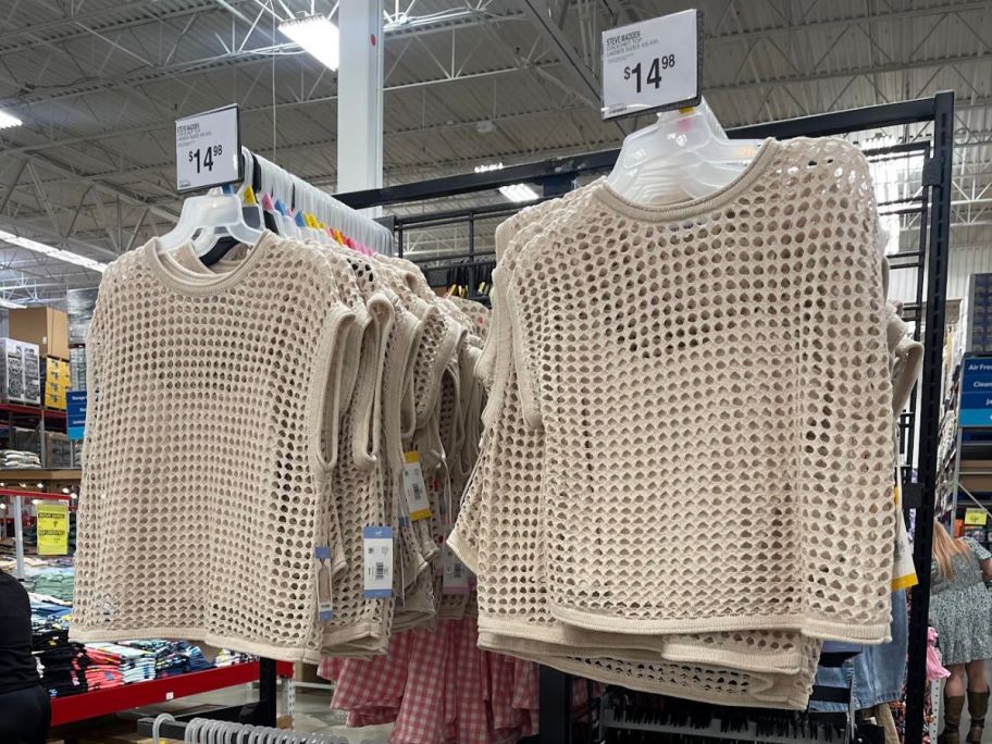 rack of tan crochet tops
