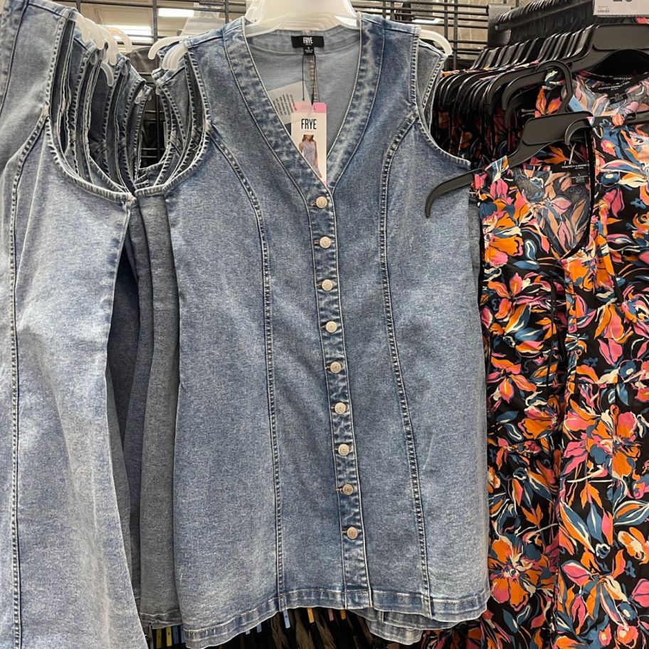 denim dress hanging in store