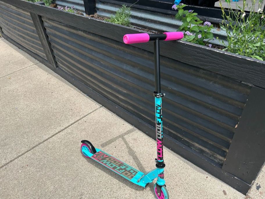 scooter on black fence