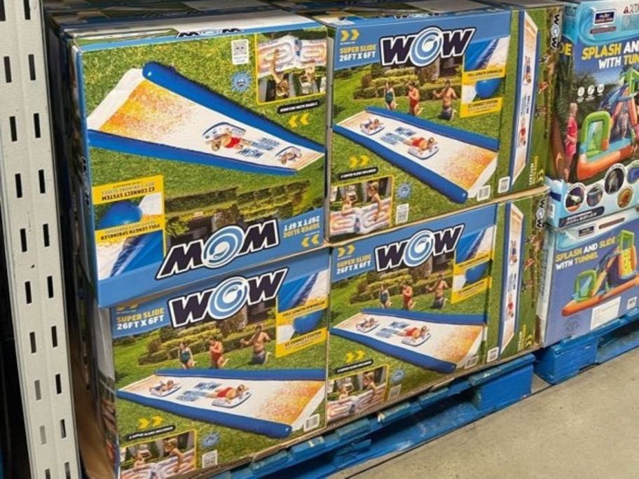 WOW Super Slide 26' Giant Backyard Water Slide boxes stacked in store