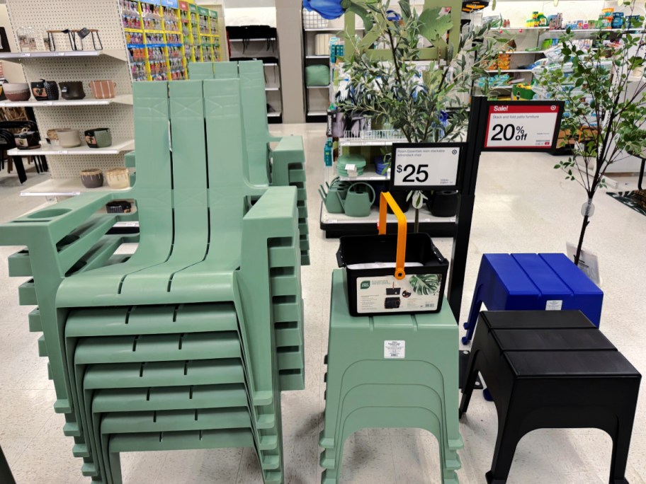 adirondack chairs and matching end tables on display in a target store