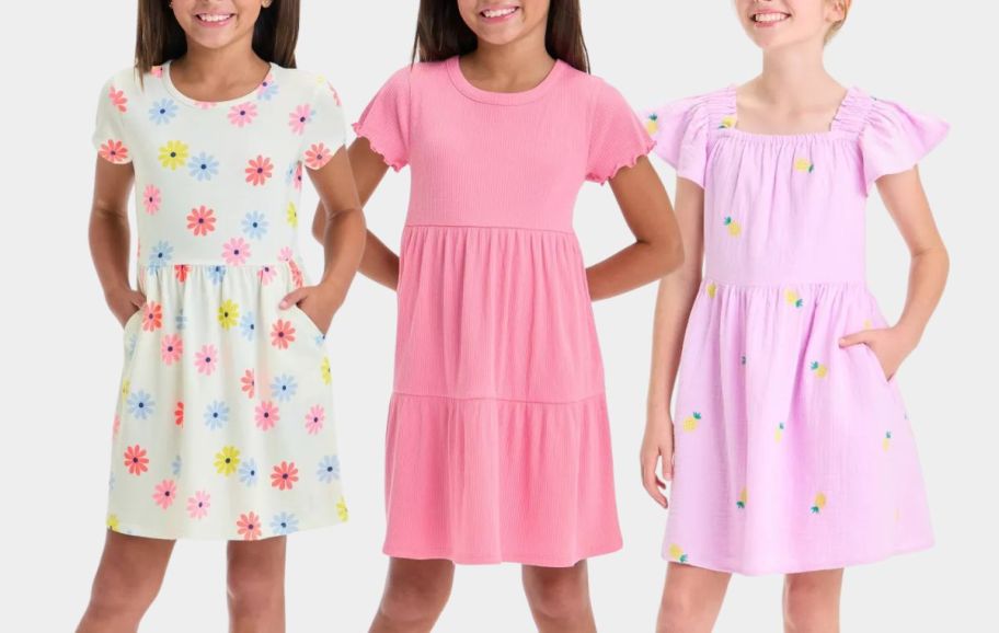 3 girls wearing spring dresses