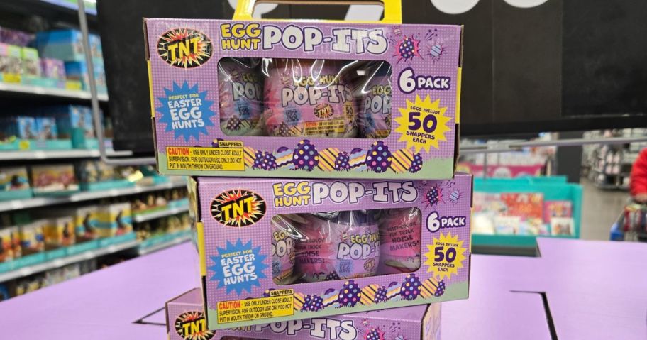 TNT Egg Hunt Pop-Its 6-Packs stacked on top of each other on display in store