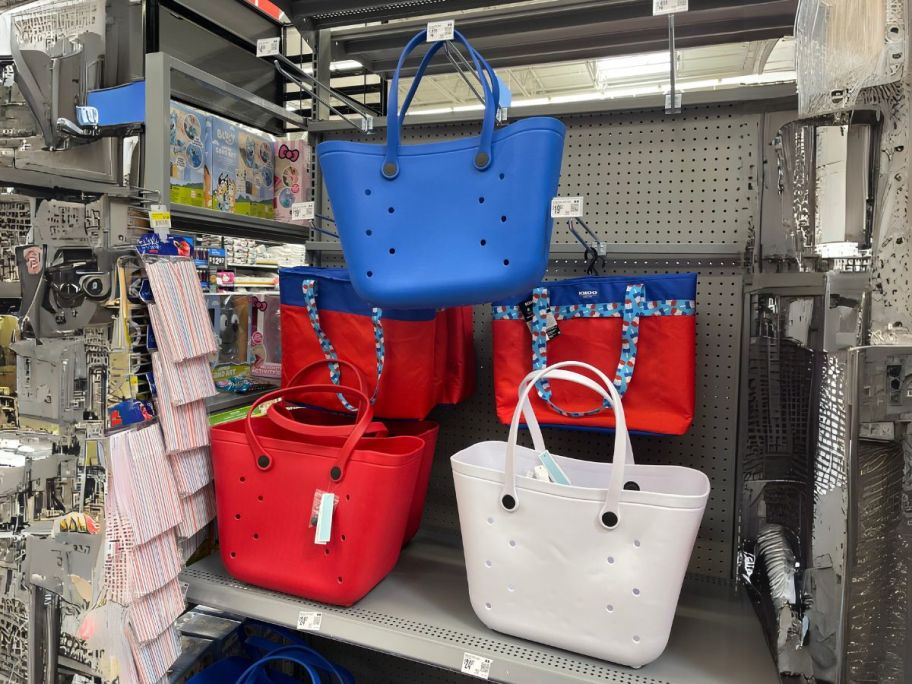 a blue, red, and white Patriotic Molded Tote Bag on display in store