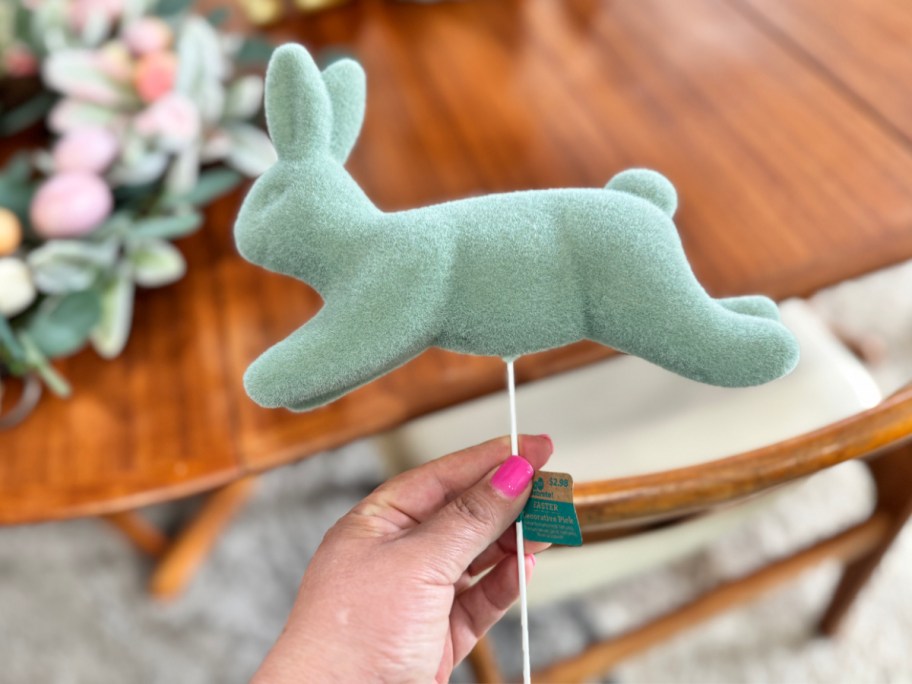 hand holding flocked bunny pick