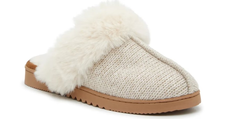 a women's slipper with faux fur trim