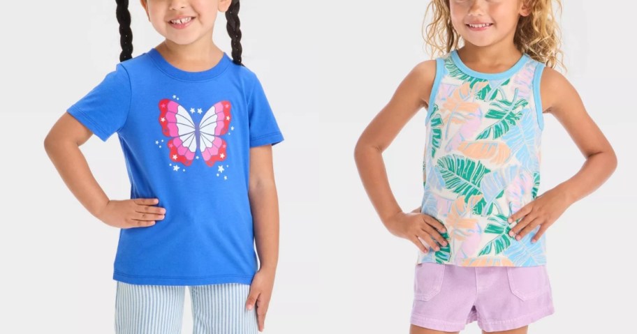 2 little girls wearing colorful shirts and tank tops