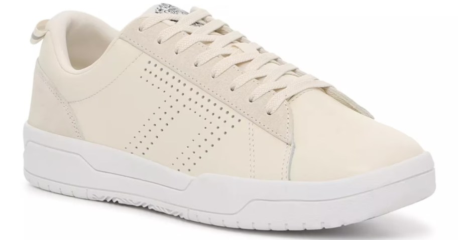 a cream color men's slipper