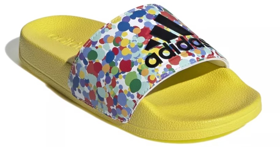 a yellow and colorful kids adidas slide