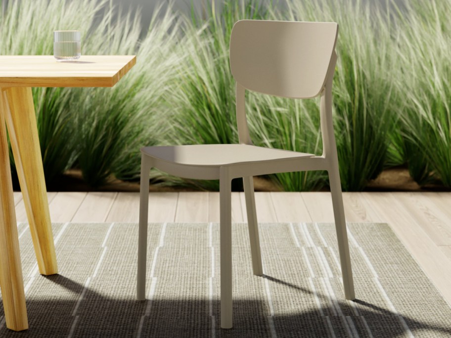 taupe chairs next to table outdoors