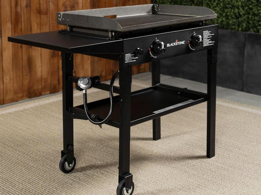 black blackstone griddle on patio