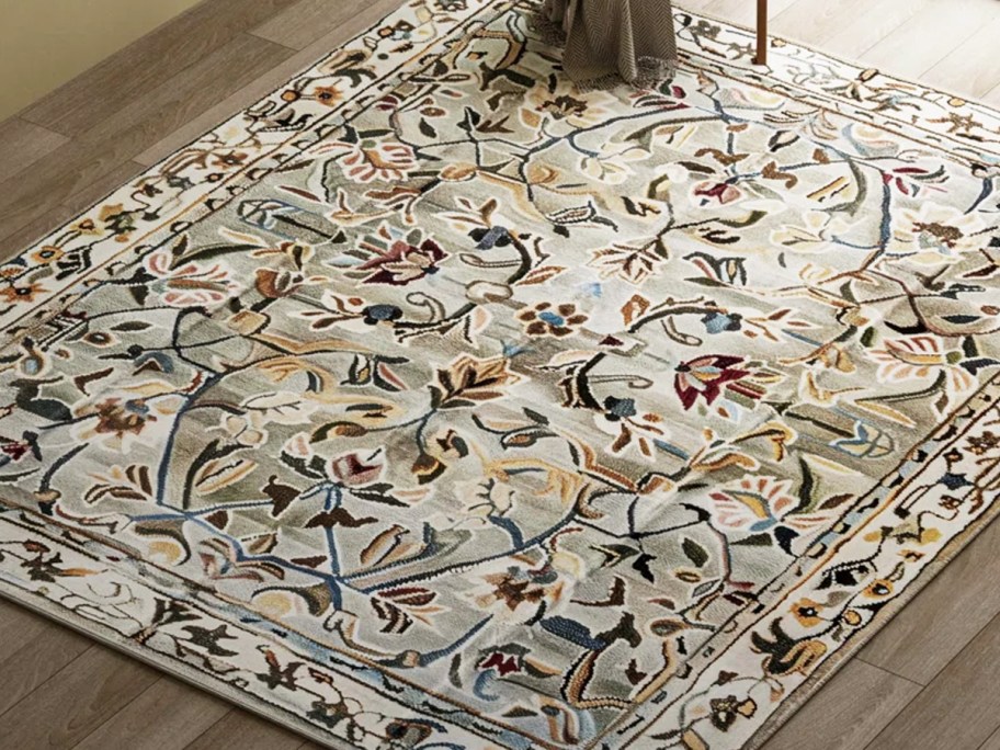 tan floral print area rug