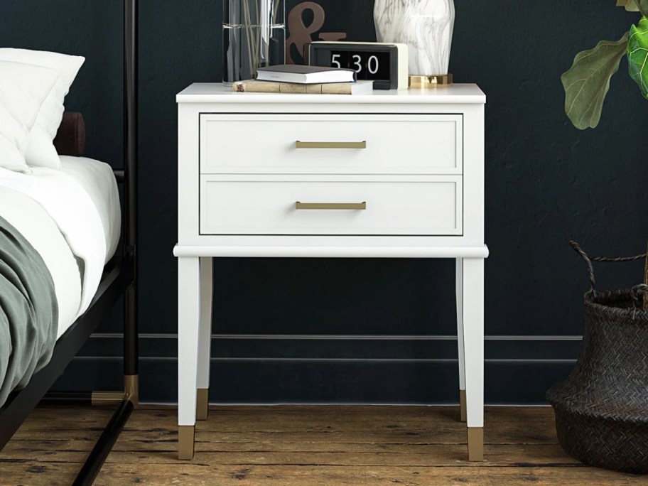 white nightstand with gold accents