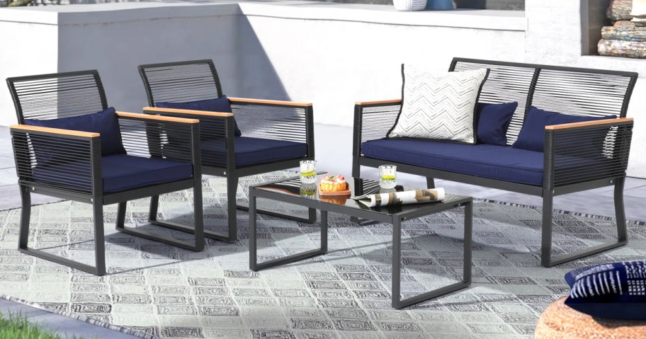wicker love seat and chairs with coffee table