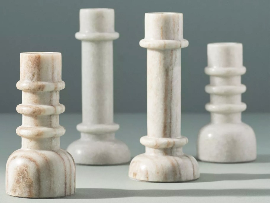 4 small marble candle holders