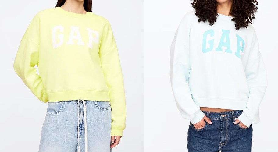 women in yellow and light blue sweatshirts