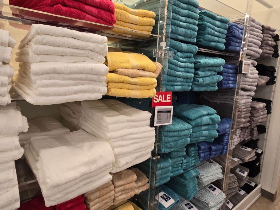 A wall of Kohl's The Big One Towels in various sizes and colors