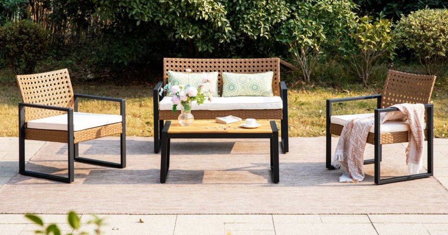 wicker love seat and chairs with coffee table