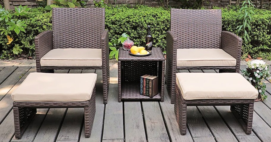 brown wicker chairs and ottomans with tan cushions