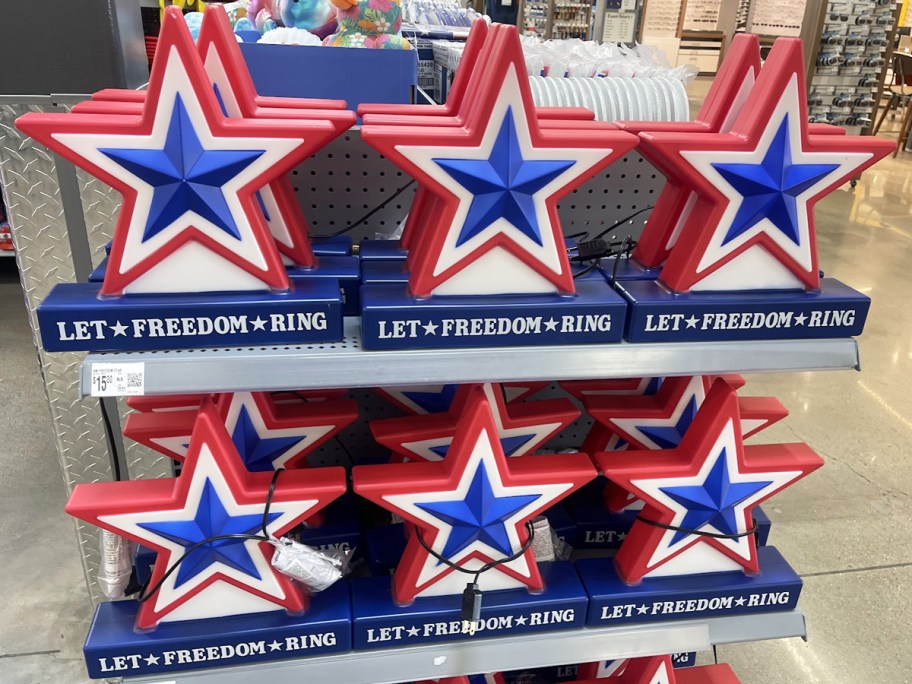 red, white, and blue star shaped blow molds that say "let freedom ring"