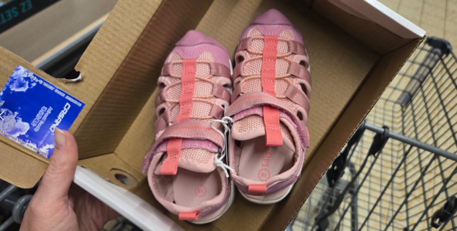 toddler pink sandals inside of their box