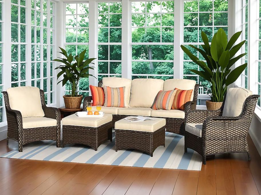 Ovios New Kenard 5 -Piece Woven Patio Sofa Conversation Set w/ Cushions in an enclosed patio