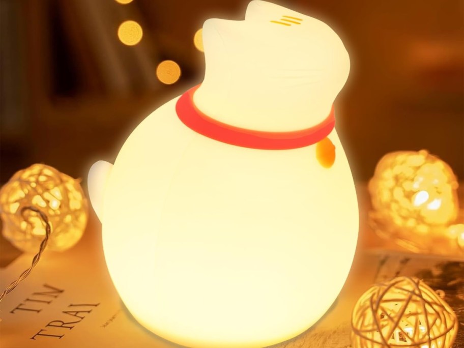 Cat night light displayed with egg lights